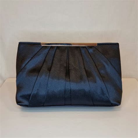 navy blue satin clutch.